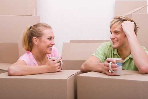 Family unpacking in their new Poplar home