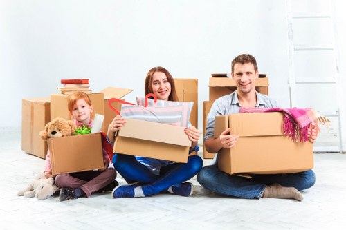 Removals Aldgate professional movers helping a family