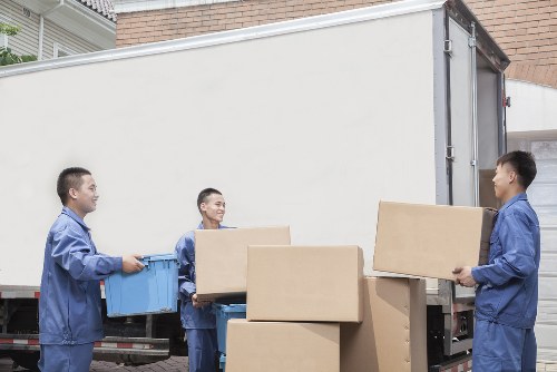 Professional movers assisting with a residential move in Archway