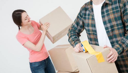 Experienced movers transporting furniture