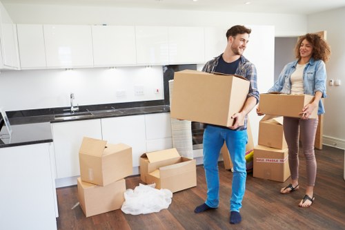 Professional movers assisting with a home relocation in Charing Cross.