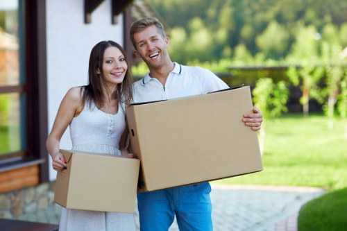 Professional movers handling furniture in Silvertown