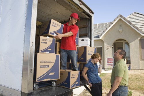 Trained removalists handling furniture with care