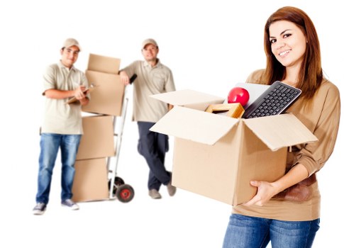 Movers carefully loading furniture into a truck in Sudbury