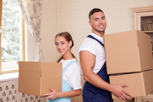Professional movers handling furniture in Chiswick